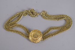 A VINTAGE CHANEL CHOKER DOUBLE STRAND NECKLACE with medallion.