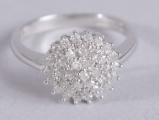 A 9CT GOLD RBC DIAMOND CLUSTER RING. Diamonds 0.33ct.