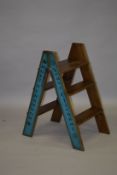 A WOODEN CHAMPAGNE LADDER. 2ft 10ins high.