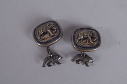 A PAIR OF RUSSIAN SILVER AND BLUE ENAMEL ELEPHANT CUFFLINKS
