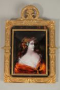 A SUPERB FRENCH LIMOGES ENAMEL PORTRAIT, HEAD AND SHOULDERS OF A YOUNG LADY, 14cms x 10cms, in an