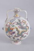 A CHINESE TWIN-HANDLE POLYCHROME MOON FLASK. 28.5cms high.