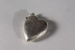 A SILVER HEART VESTA CASE.
