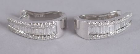 A GOOD PAIR OF 18CT GOLD AND DIAMOND EARRINGS