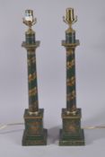 A PAIR OF GREEN TOLEWARE LAMPS. 26ins high.