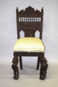 A GOOD LARGE INDIAN CARVED CHAIR.