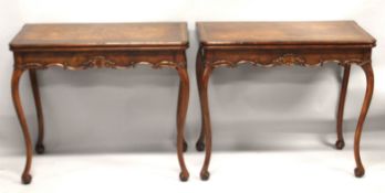 A GOOD PAIR OF IRISH MAHOGANY FOLDING TOP CARD TABLES, with plain top and leather interior