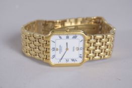 A RAYMOND WEIL FIDELO WRIST WATCH with gilt metal bracelet.