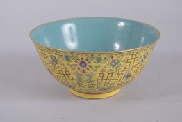 A CHINESE YELLOW GROUND POLYCHROME PORCELAIN BOWL. 16.5cms diameter.