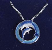 A STERLING SILVER WHALE PENDANT.