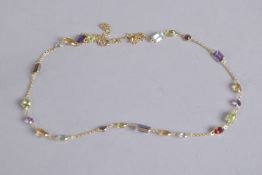 AN 18CT GOLD MULTI GEM NECKLACE. 18ins long.