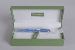 AN UNUSUAL NEW MONTEGRAPPA BLUE SPECKLED BALL POINT PEN, 14ct gold nib. Boxed