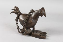 A 19TH CENTURY INDIAN BRONZE CHICKEN SHAPE OIL LAMP, bronze 20cm wide.