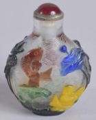 A 19TH CENTURY CHINESE FIVE-COLOUR PEKING GLASS SNUFF BOTTLE, decorated with boys, fish, and lotus