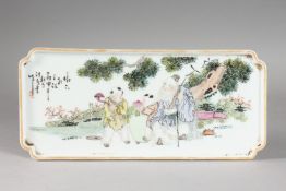 A CHINESE PORCELAIN RECTANGULAR TRAY, painted with a wise man and children beside a tree, 14cm x