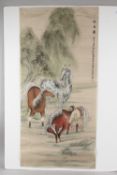 A LARGE CHINESE PAINTING ON SILK, depicting horses being groomed, inscribed and bearing red seal