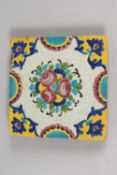 A 19TH CENTURY PERSIAN GLAZED POTTERY TILE, 20cm square.