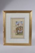 AN ISLAMIC PERSIAN MINIATURE PAINTING ON PAPER, depicting a scene of horsemen and attendants, framed