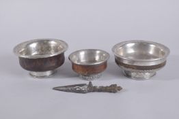 THREE TIBETAN MONGOLIAN SILVER MOUNTED BOWLS, the largest embossed dragon and precious objects, 12cm