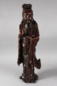 A LARGE 19TH CENTURY CHINESE CARVED HARDWOOD FIGURE, 57cm high.