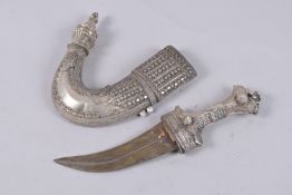 A LARGE OMANI WHITE METAL MOUNTED JAMBIYA, 36cm long.