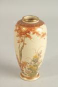 A JAPANESE SATSUMA VASE, painted with flora and fine gilt highlights, signed to base, 15.5cm high.