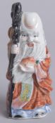 A 20TH CENTURY CHINESE SHAO LAO FIGURAL PORCELAIN SNUFF BOTTLE, 9cm high.