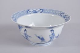 A CHINESE KANGXI PERIOD BLUE AND WHITE PORCELAIN BOWL, painted with female figures and boys, the