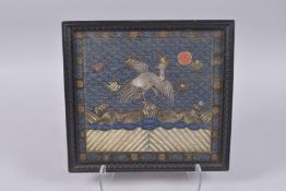 A FINE 19TH CENTURY CHINESE METAL EMBROIDERED TEXTILE WITH INSET CORAL BEADS, framed and glazed,