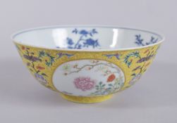 A CHINESE DAOGUANG YELLOW GROUND FAMILLE ROSE PORCELAIN MEDALLION BOWL, mark and period, the