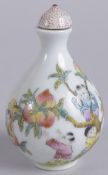 A 20TH CENTURY CHINESE FAMILLE ROSE PORCELAIN SNUFF BOTTLE, with boys and peach blossom, base with