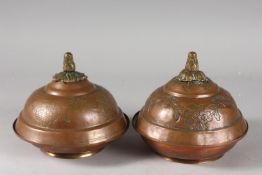 A FINE PAIR OF 18TH CENTURY OTTOMAN TURKISH GILT COPPER TOMBAK LIDDED DISHES, the interior with fine