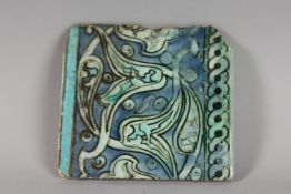 A 16TH-17TH CENTURY OTTOMAN DAMASCUS TILE, with split palmet designs, 15cm x 14cm.