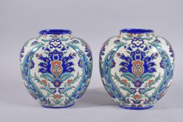 A PAIR OF EUROPEAN / ISLAMIC MARKET ENAMEL PAINTED PORCELAIN VASES BY LAROCHE BELGE, with sprays