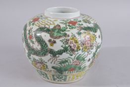 A CHINESE FAMILLE VERTE PORCELAIN DRAGON JAR, further decorated with flowers and lily pads as well