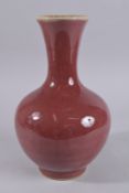 A LARGE CHINESE COPPER RED GLAZE PORCELAIN VASE, with six-character mark to base, 34cm high.