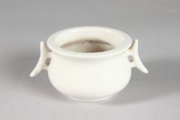 A SMALL CHINESE BLANC DE CHINE TWIN HANDLE CENSER, with impressed mark to base, 12cm handle to