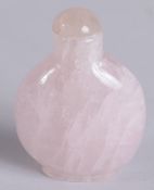 A 20TH CENTURY CHINESE ROSE QUARTZ SNUFF BOTTLE, 6cm high.