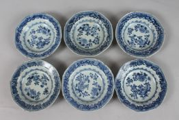 A SET OF SIX 18TH-19TH CENTURY CHINESE BLUE AND WHITE PORCELAIN DISHES, painted with floral designs,