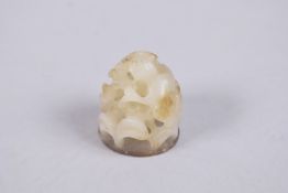 A VERY FINE 19TH CENTURY CHINESE JADE CARVING, depicting cranes and openwork foliage, 3cm high.