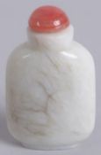 A 20TH CENTURY CHINESE WHITE JADE SNUFF BOTTLE, 6cm high.