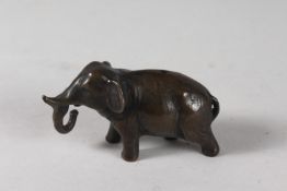 A JAPANESE MEIJI PERIOD BRONZE ELEPHANT WATER DROPPER, 9cm long.
