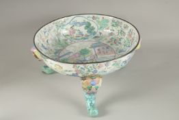 A VERY LARGE CHINESE CANTON ENAMELLED BOWL, raised on curving tripod legs with shaped beast head