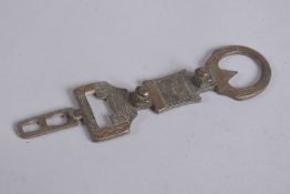 A 19TH CENTURY NORTH AFRICAN TUAREG BELT BUCKLE.