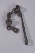 AN 18TH CENTURY ISLAMIC POSSIBLY IRAN METAL CHAIN.