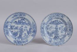A PAIR OF 18TH CENTURY CHINESE BLUE AND WHITE PORCELAIN DISHES, painted with landscape scenes and