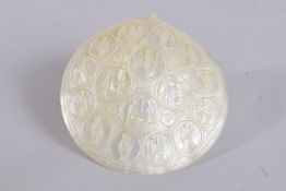 A VERY FINE LATE 18TH CENTURY HOLY LAND JERUSALEM CARVED MOTHER OF PEARL SHELL, depicting various