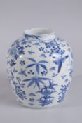 A 19TH CENTURY CHINESE BLUE AND WHITE PORCELAIN JAR, painted with birds and flora, base with