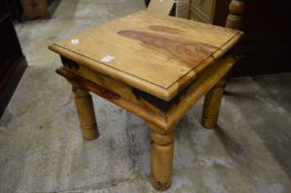 A hardwood coffee table.