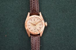 A ladies Rolex Oyster Precision 18ct gold wristwatch, circa 1950, subsidiary seconds dial at six o'